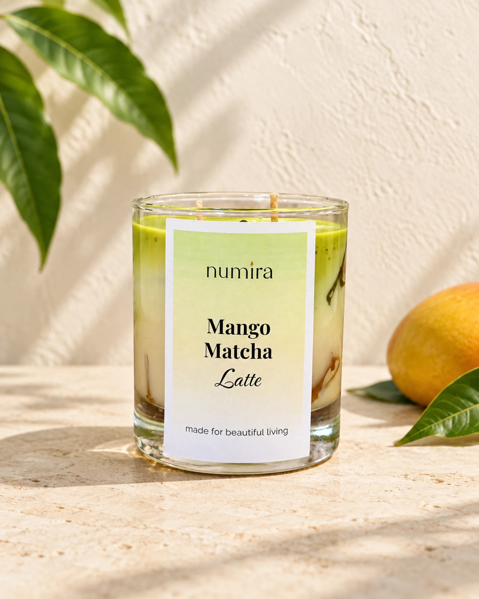 Mango Matcha Latte mango scented candle in a clear glass jar