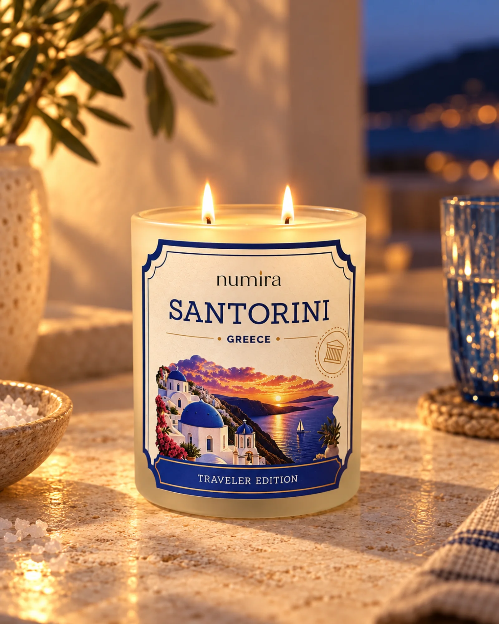 Santorini, Greece sea salt scented candle lit in a warm lifestyle setting